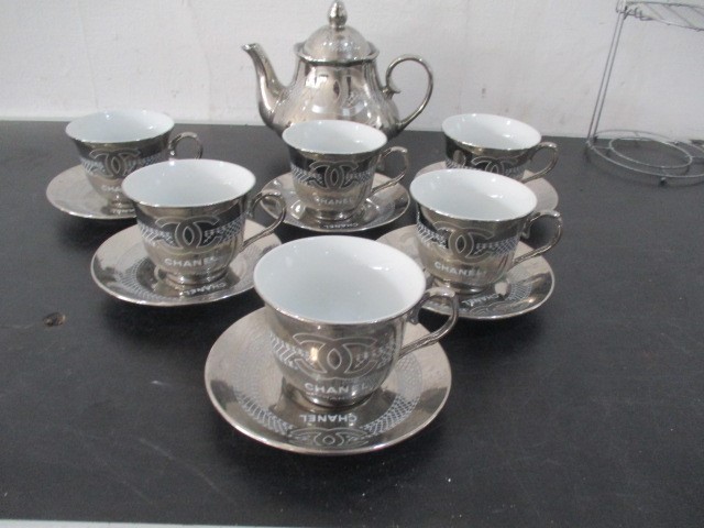 A Chanel porcelain tea set with silver colour glaze all decorated with the Chanel logo on stand- tea - Image 6 of 6