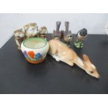 A Clarice Cliff "Crocus" pot (missing lid), along with three Beswick birds, Russian deer figurine
