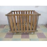 A vintage factory wooden slatted bobbin trolley