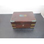 A mahogany brass bound jewellery box