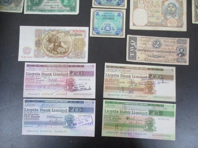 A collection of foreign banknotes along with travellers cheques etc. - Image 2 of 5