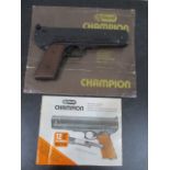 A boxed German Champion .177 air pistol "12 shot repeater"
