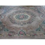 A large Chinese rug - 10 x 8ft