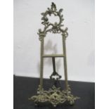An ornate brass table top easel, approx 53 cm height