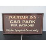 A vintage Fountain Inn car parking sign