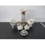 A collection of porcelain including cherub bowls, an Alfred Pearce urn and parian centre piece etc