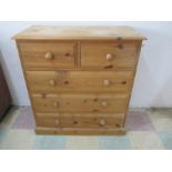 A pine chest of five drawers