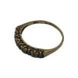 A 9ct gold diamond and emerald half eternity ring, size K1/2