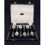 A cased set of hallmarked silver coffee spoons