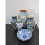 A collection of four oriental porcelain vases (large vase A/F), along with an oriental bowl.