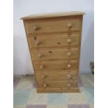 A pine chest of six drawers
