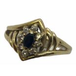 An 18ct gold diamond and sapphire dress ring.