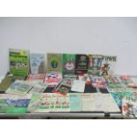 A collection of vintage football programmes dating from 1949 onwards, including the 1966 souvenir