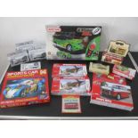 A Meccano tuning radio control car (6950), along with three Airfix model kits, boxed die cast cars