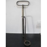 A WW2 brass stirrup pump