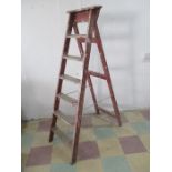 A vintage wooden step-ladder