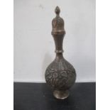 A Persian copper urn