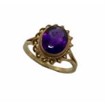 A 9 ct gold ring set with an amethyst