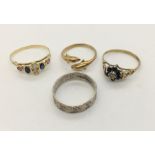 A 14ct gold dolphin ring (1.6g) along with an 18ct gold ring (A/F) a 9ct gold diamond and sapphire