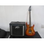 An Ibanez SA Series electric guitar, along with Peavey Express 112 amp.