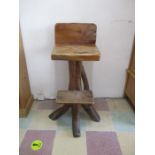 A naturalistic wood bar stool
