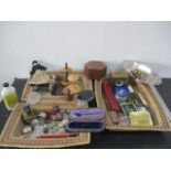 A collection of interesting items including wooden mechanical bottle stopper, doll, glass
