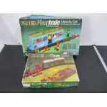 A boxed Faller battery operated Playtrain Intercity set, along with a mini Playtrain set.