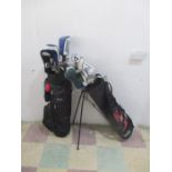 Two sets of golf clubs including Wilson irons, along with a selection of drivers, woods and
