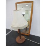 A mid century mirror and table lamp