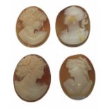 Four unframed carved shell cameos