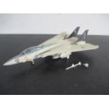 A diecast F-14 Tomcat Navy fighter jet