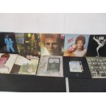 A collection of six David Bowie 12" vinyl records, along with four albums by Led Zeppelin.