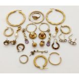 A collection of 9ct gold earrings, studs etc. Total weight 20.8g