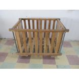 A vintage factory wooden slatted bobbin trolley