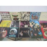 A collection of fifteen Rolling Stones 12" vinyl records including Sticky Fingers, "Exile On Main
