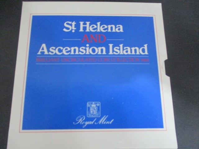 Three sets of "The Great British 1983 Coin Collection" along with St Helena & Ascension Island