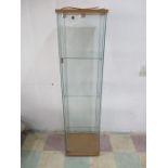A glass display cabinet - key in office