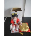 A limited edition boxed Japanese porcelain doll named Mae, with certificate of authenticity.