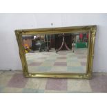 A gilt mirror - length 105cm, height 75cm