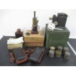 A Bing vertical steam engine ( A/F) along with vintage cameras, darkroom lamp, projector etc.
