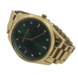 A gold coloured stainless steel ladies Michael Kors wristwatch with metallic green face and pave