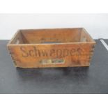 A vintage Schweppes wooden crate