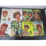 A collection of eight I Love Lucy comics
