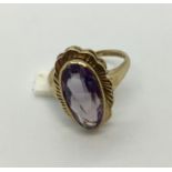 A 9 ct gold ring set with large amethyst