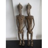 A pair of African bronzes - 42cm in height