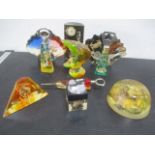 A collection of vintage Lucite items- paperweights, bottle openers etc.