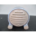 An Art Deco shaped speaker in blue and pink bakeite