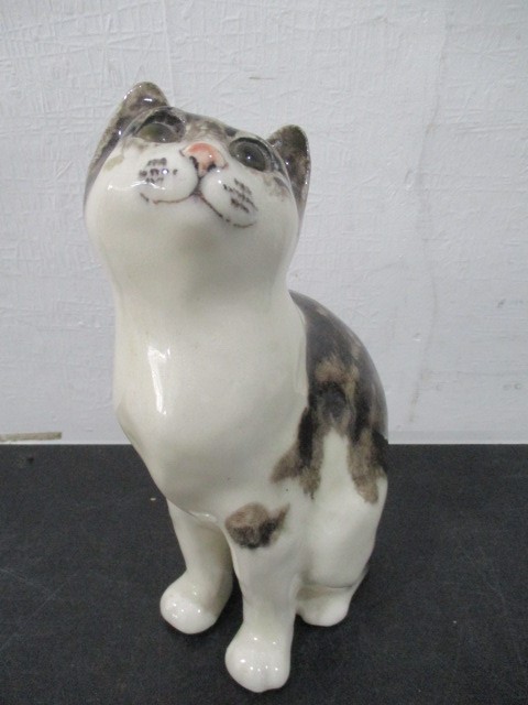 A Winstanley pottery figure of a sitting cat - height 22cm