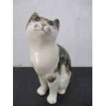 A Winstanley pottery figure of a sitting cat - height 22cm