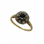 An 18ct gold diamond and sapphire cluster ring